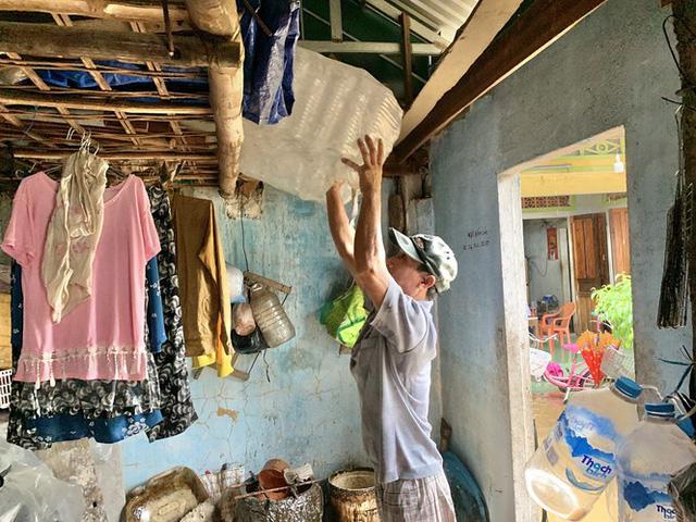 Người dân Quảng Ngãi, Quảng Nam hối hả chạy lũ - Ảnh 6. Người dân Quảng Ngãi, Quảng Nam hối hả chạy lũ - Ảnh 6.