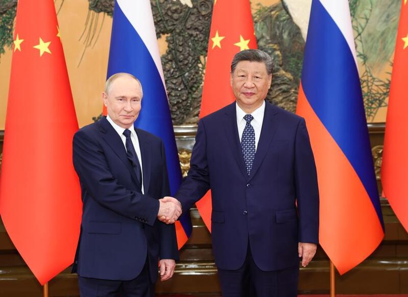 Tổng Bí thư, Chủ tịch nước Trung Quốc Tập Cận Bình và Tổng thống Nga Vladimir Putin  khẳng định tăng cường hợp tác. Ảnh: Tân Hoa Xã